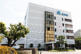 Alpha exterior, logo and signage